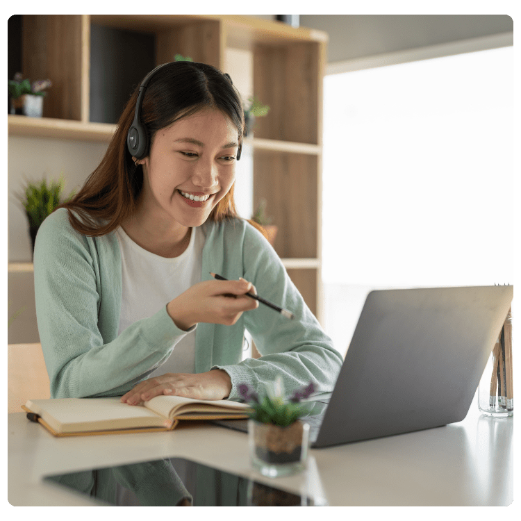 Woman using NetMarkets on her laptop